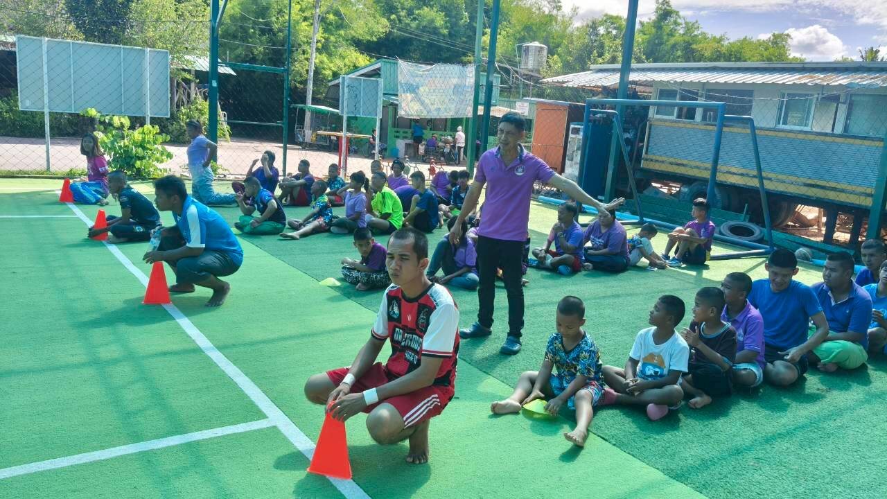 Coach Abbas leading a full group session